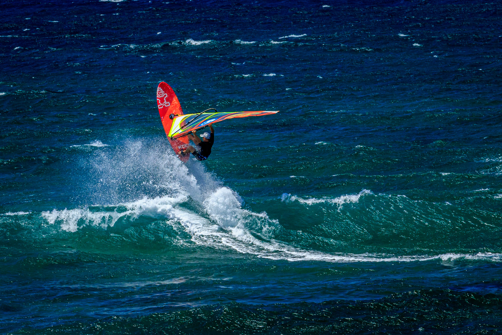 Wind surfer "catching air"